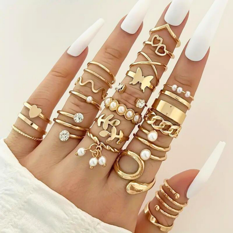 Éclectique et brillant ensemble de 22 bagues