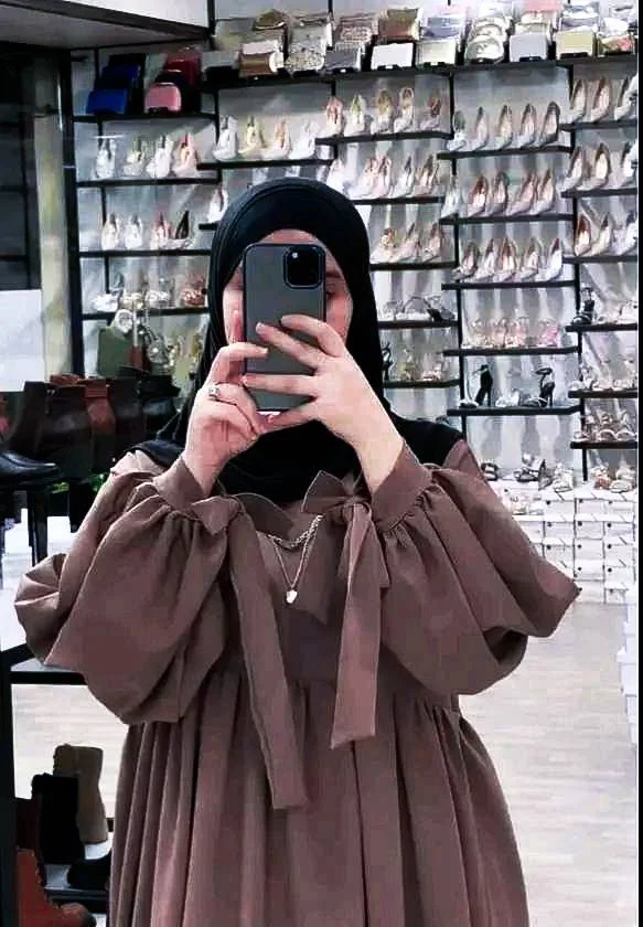 حجاب الفضفاض بني