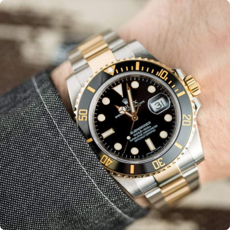 ROLEX SUBMARINER BLACK AND GOLD