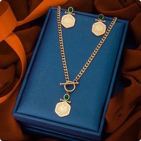 collier et boucle d’oreille en acier M2 + boite cadeu