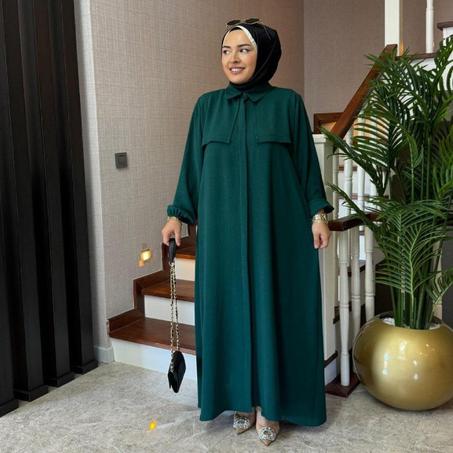 عباية محتشمة و فضفاضة بتصميم راقٍ وإطلالة ساحرة