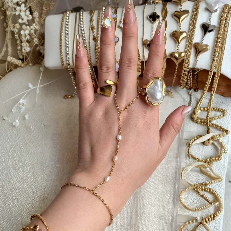 (Perles blanches)	Chaîne de main Perles d'Orient