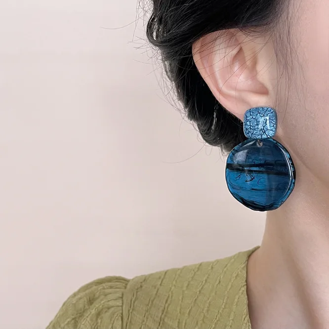 B- Boucles d'oreilles circulaires