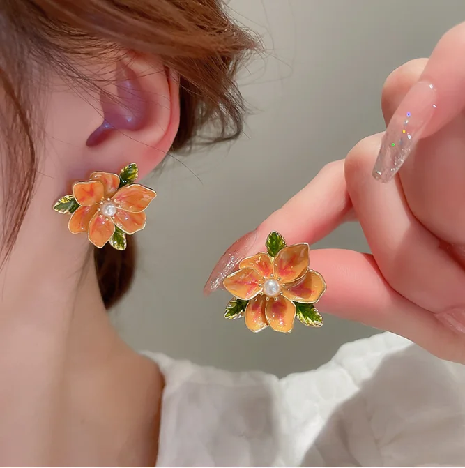 Boucles d'oreilles en forme de fleur et de feuilles avec effet de goutte d'huile et perle artificielle