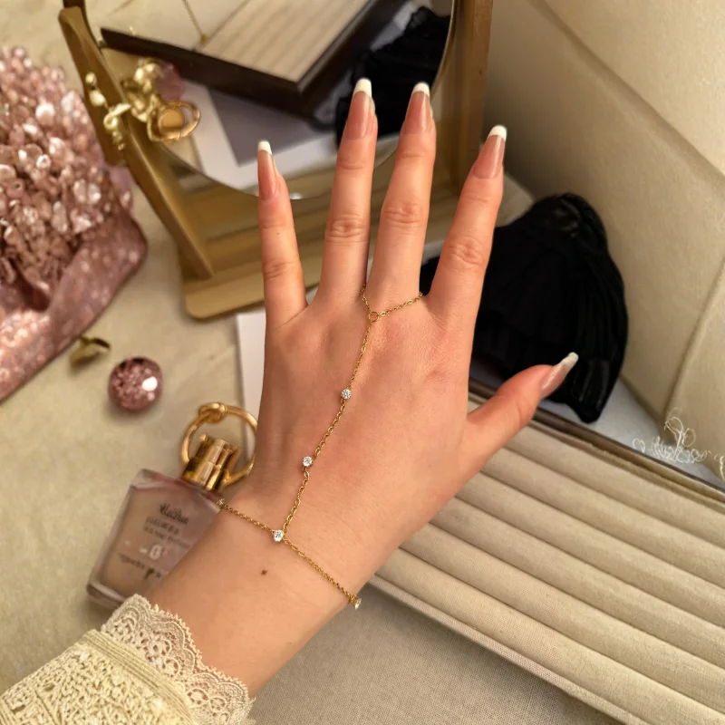 (Trois cristaux)	Chaîne de main Éclat Trio