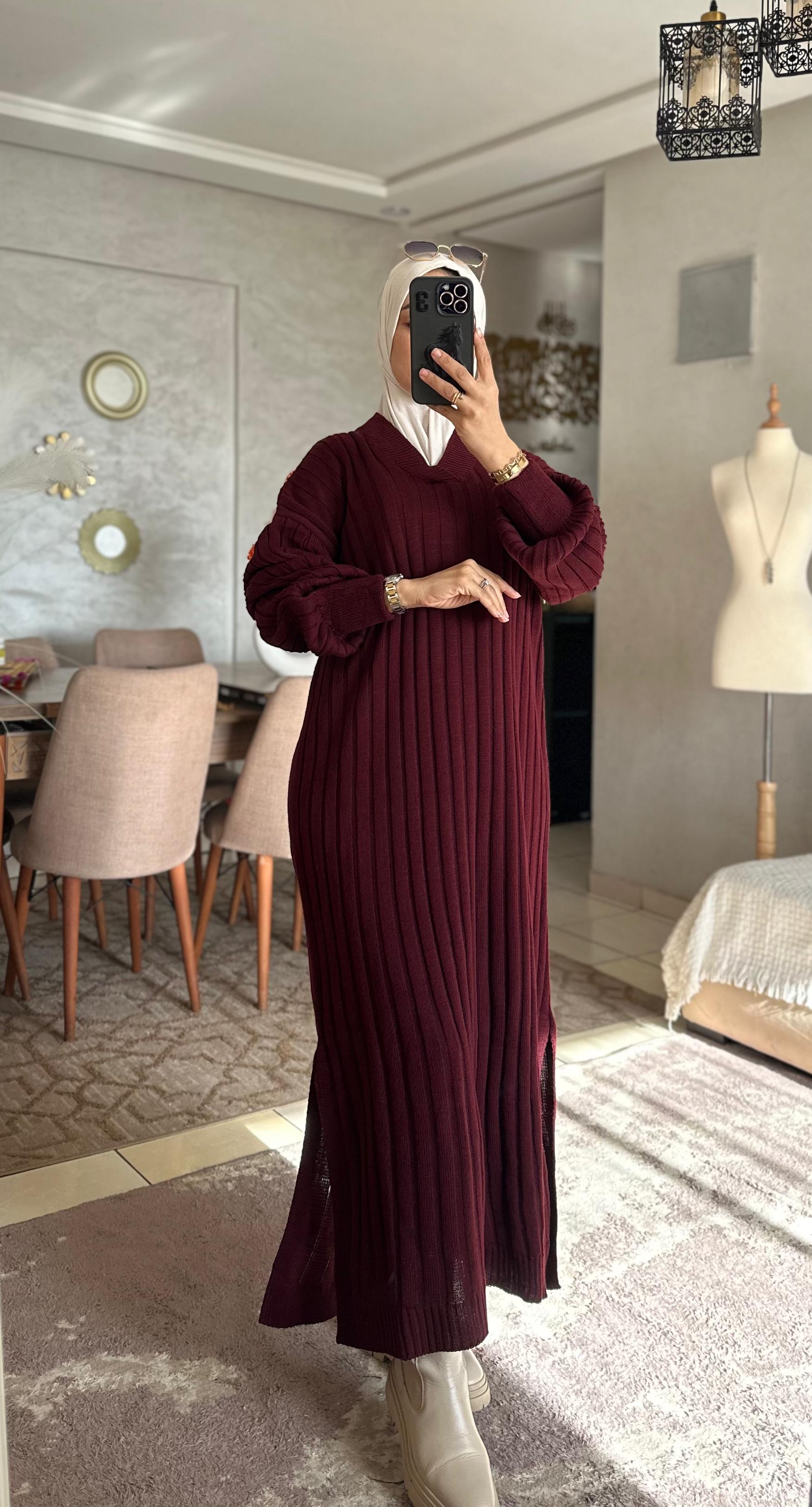 الدفء الشتوي:فستان محتشم يرضي ذوقكِ وينقذكِ من البرد