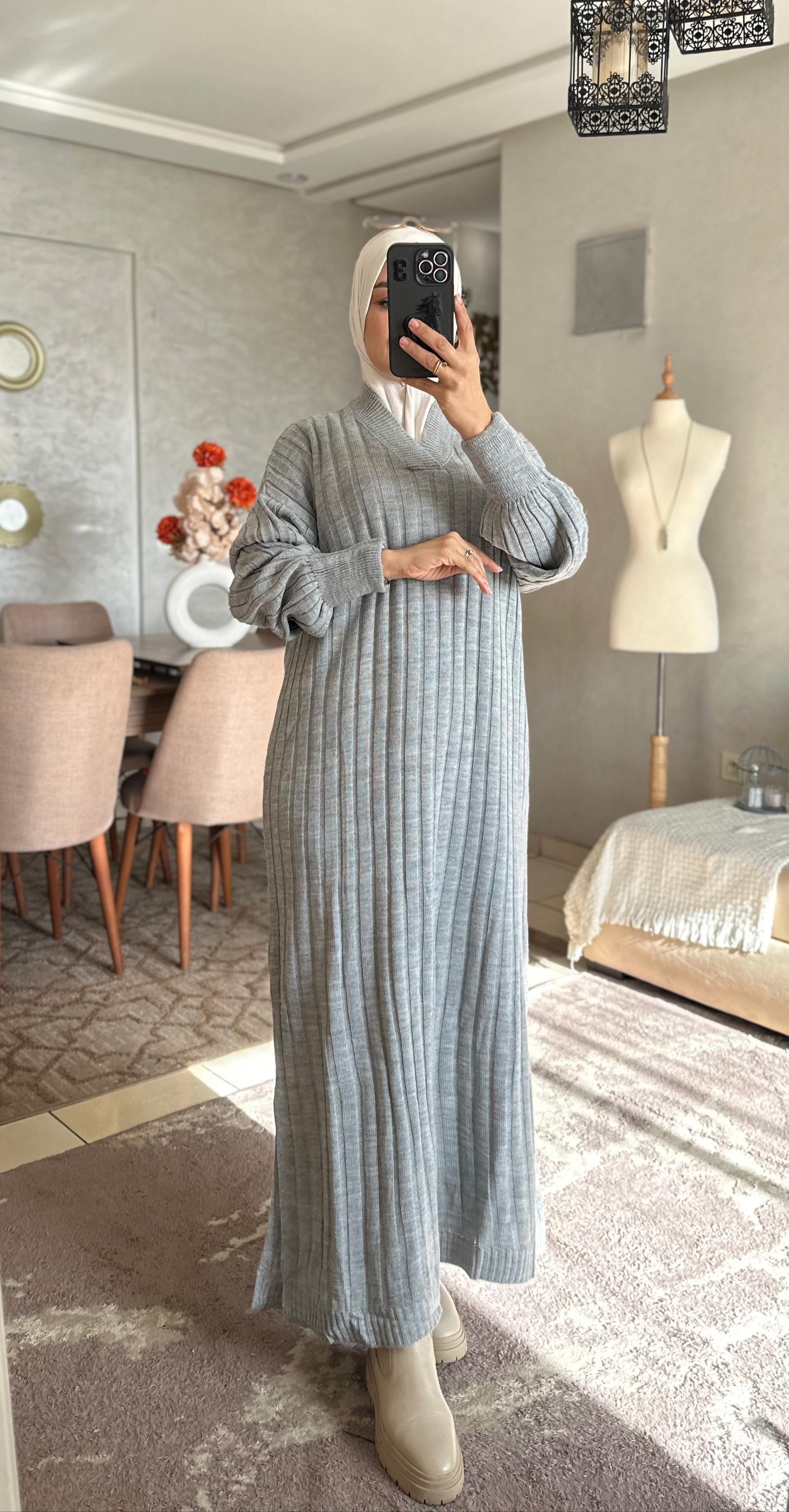 الدفء الشتوي:فستان محتشم يرضي ذوقكِ وينقذكِ من البرد