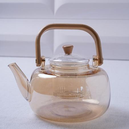 théière en verre couleur miel