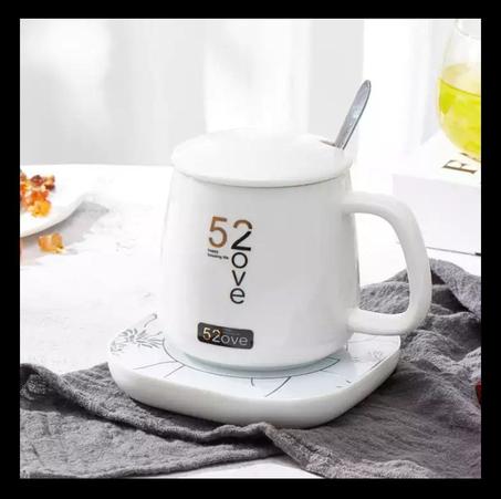 فنجان مع قاعدة لتسخين السوائل