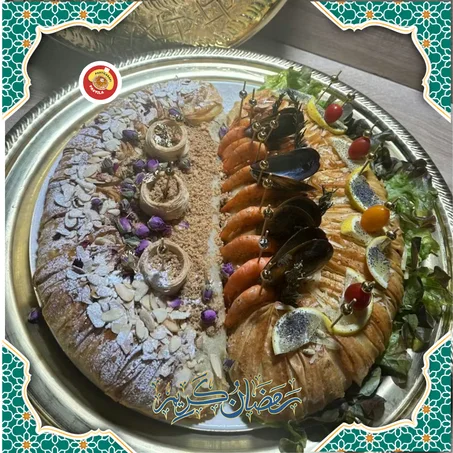 Twin Passtilla de luxe moitié fruit de mer moitié poulet amande