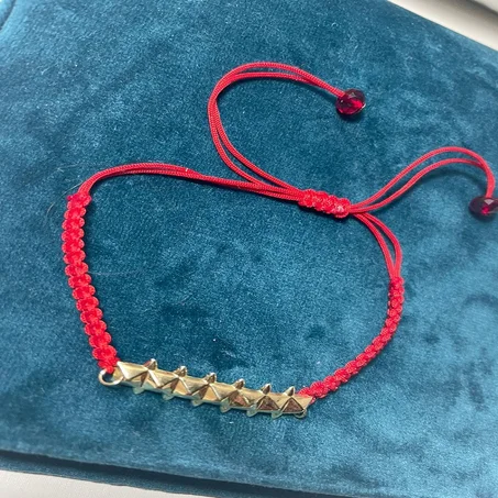 18 k براسلي كلاش ذهب /Bracelet en or clash rouge