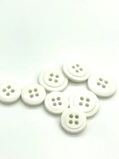 زر بلاستك أبيظ