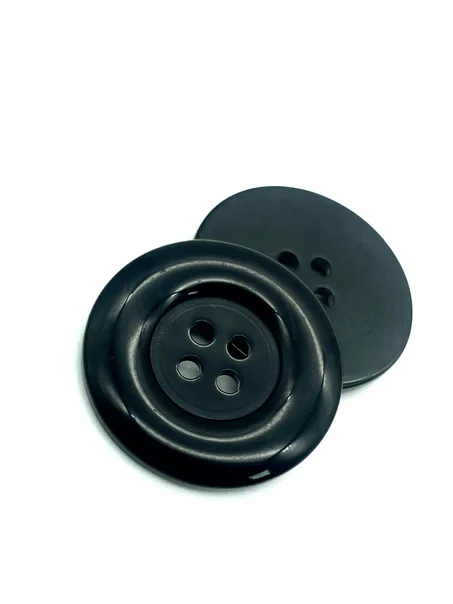 زر كبير بلاستك أسود