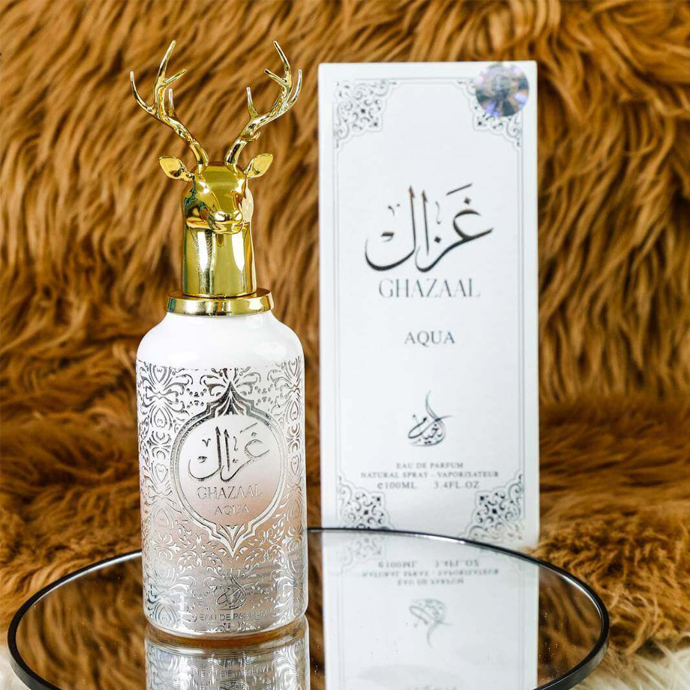 عطرغزال الأبيض + سجادة صلاة بتكاية