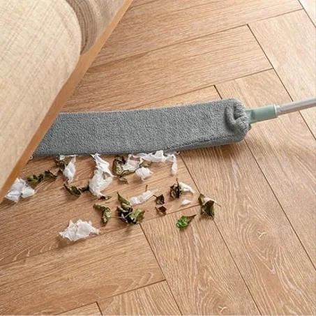 UTENSILIO DE LIMPIEZA RETRÁCTIL PARA EL POLVO