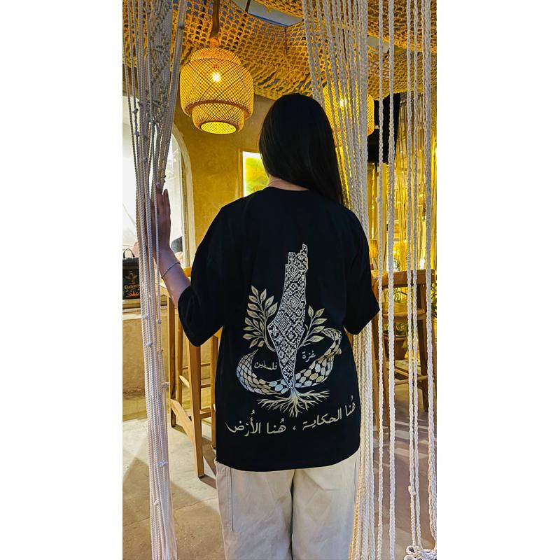 تيشيرت هُنا الحكاية ، هُنا الأرض