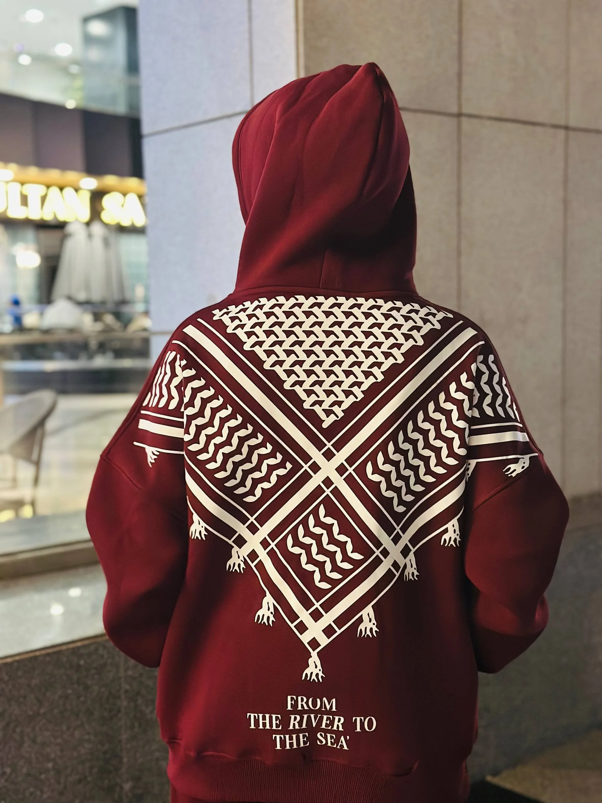 " هودي الكوفية "