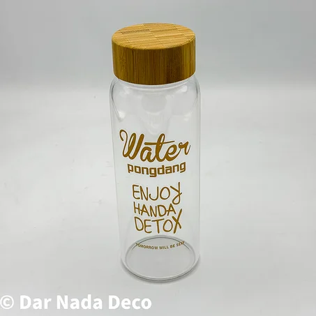 Bouteille d'eau en verre avec couvercle en bambou