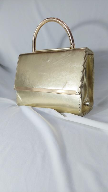 Sac avec bandoulière en chaîne métallique