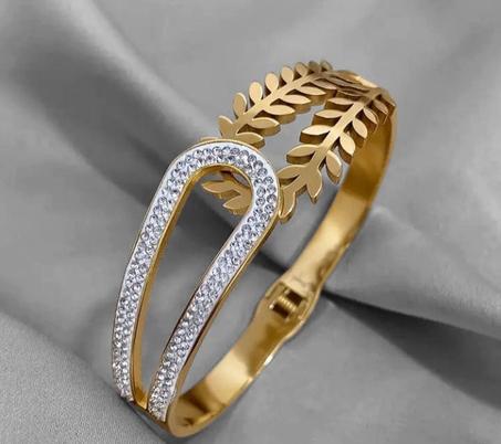 Bracelet vintage en acier inoxydable avec motif de feuilles et incrustation de strass