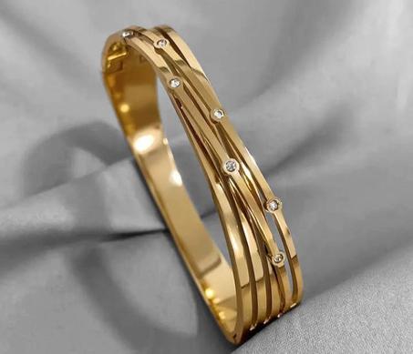 Bracelet en acier inoxydable croisé avec décoration en strass