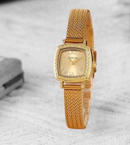 Montre à Quartz Dorée pour Femme avec Numéros Romains, Bracelet en Acier Inoxydable