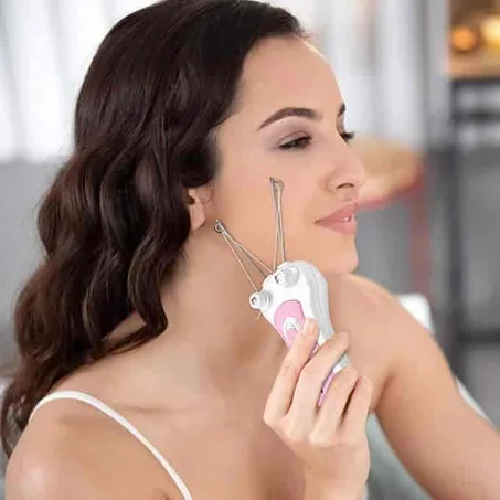 جهاز إزالة الشعر بالخيط