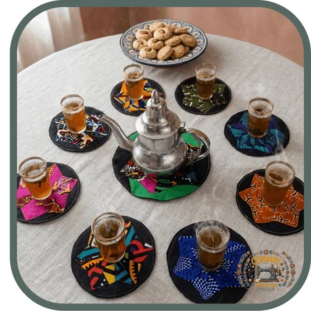 Ensemble de neuf pièces sous-theière et sous-verres