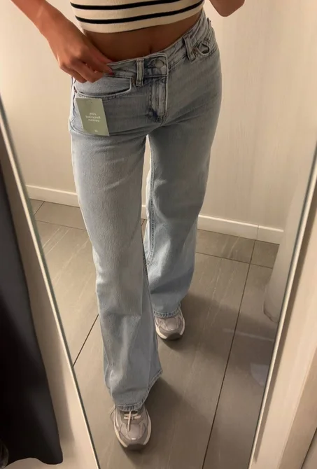 light-wash blue jeans