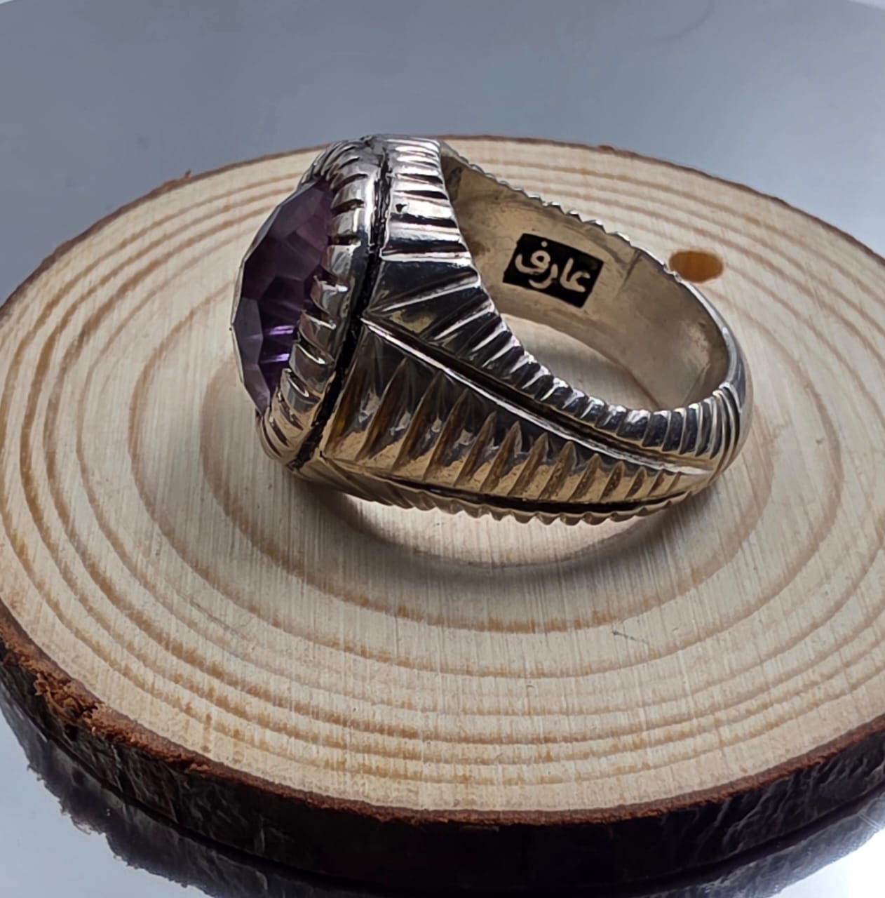 خاتم رجالي فضه بجوهره من حجر الاماتيست تقطيع فاسيت ليزر مميز