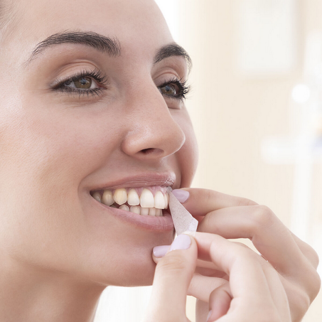 شرائط تبييض الأسنان