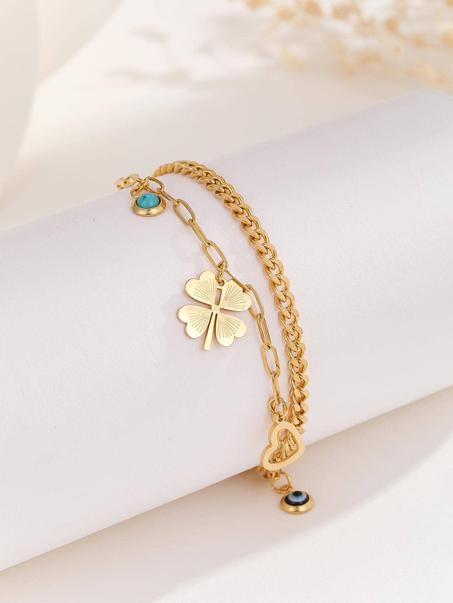 Bracelet à breloque trèfle et mauvais œil