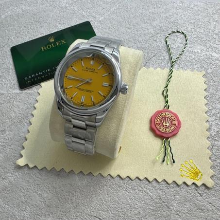 Rolex Oyster Perpetual - yellow
