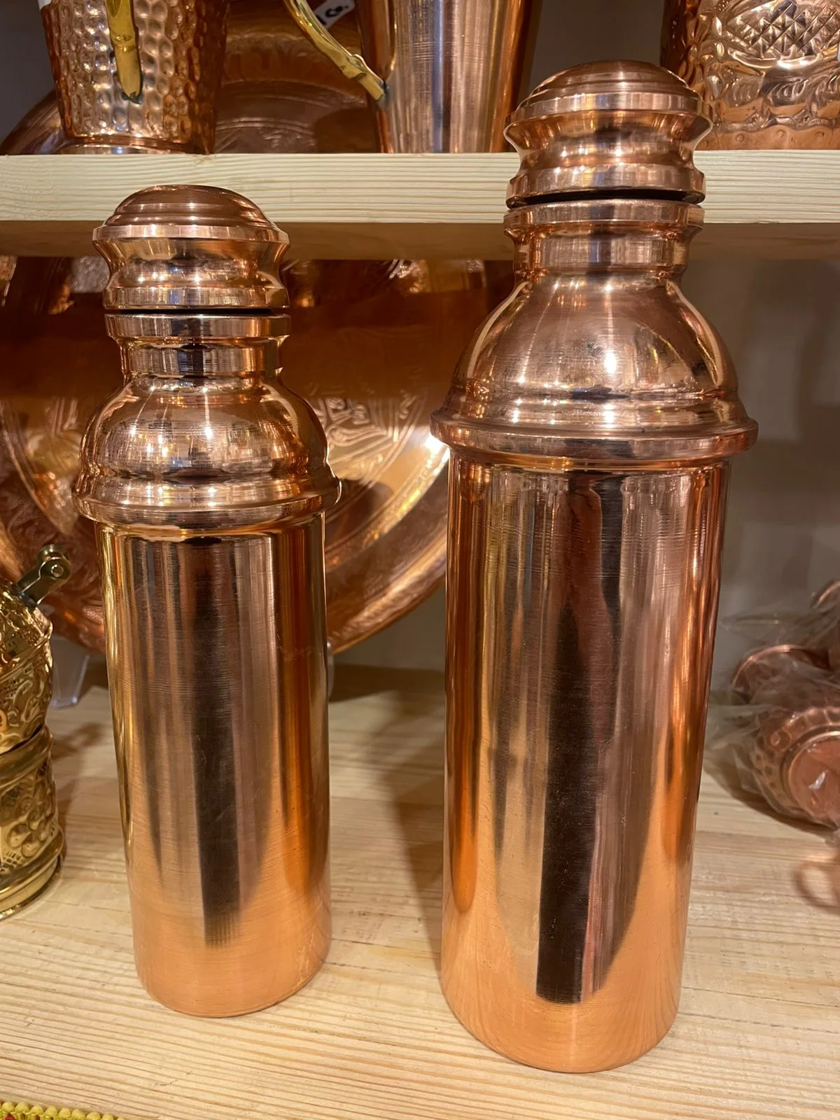 زجاجه مياه نحاس احمر - كبيره و صغيره