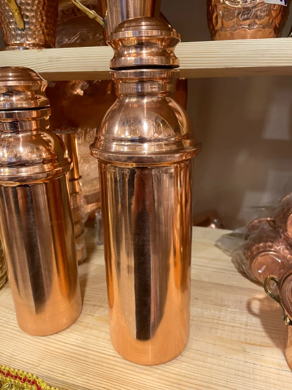 زجاجه مياه نحاس احمر - كبيره و صغيره