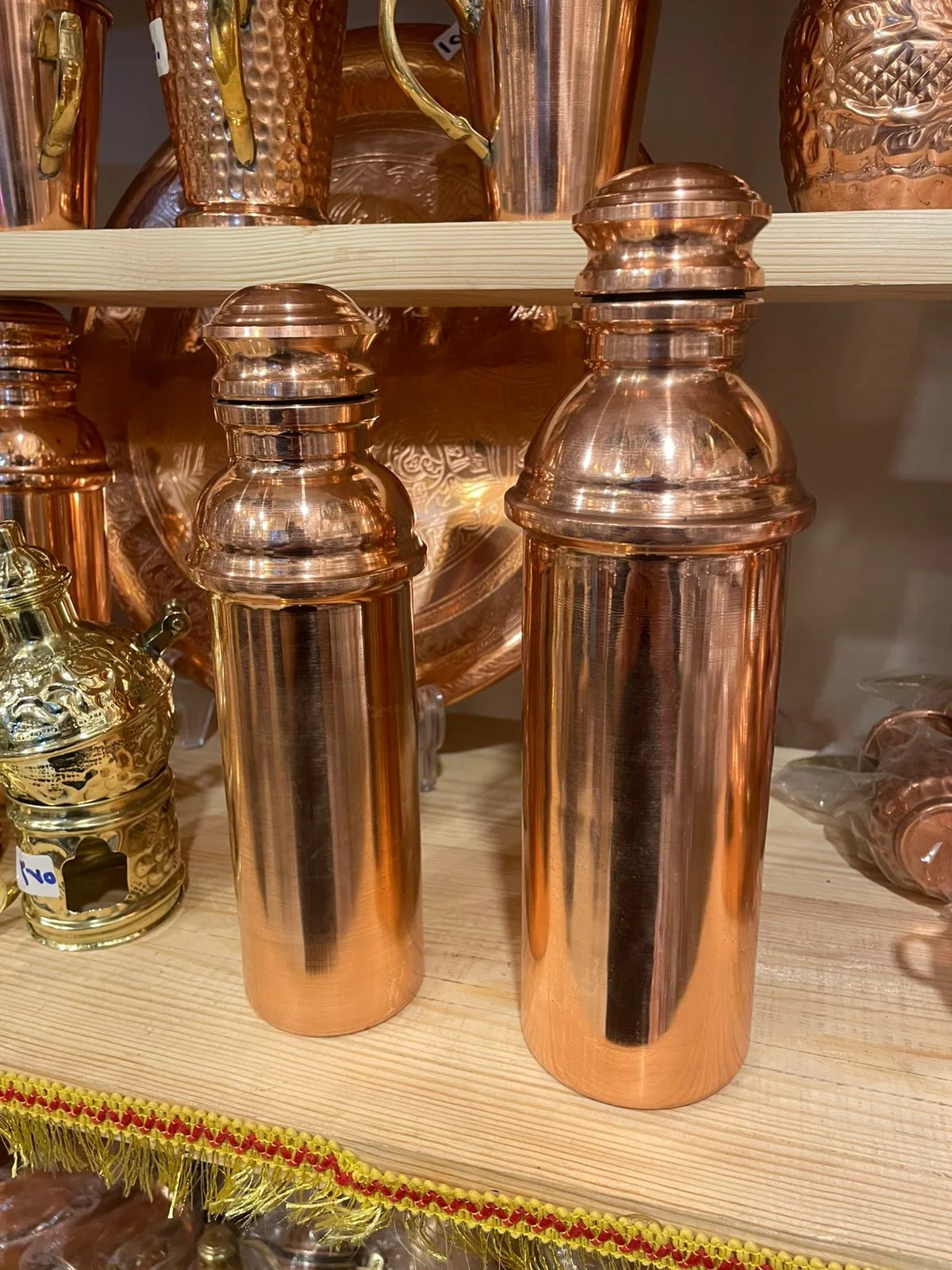 زجاجه مياه نحاس احمر - كبيره و صغير  (تحصين)