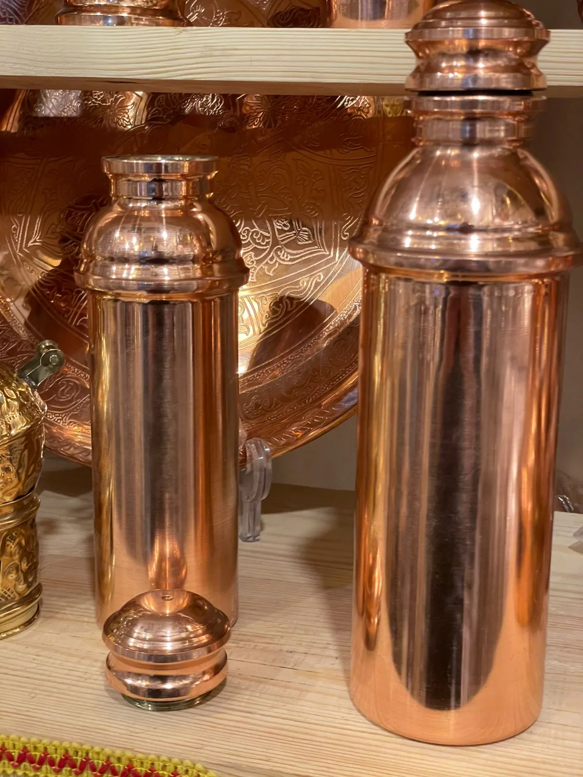 زجاجه مياه نحاس احمر - كبيره و صغير  (تحصين)