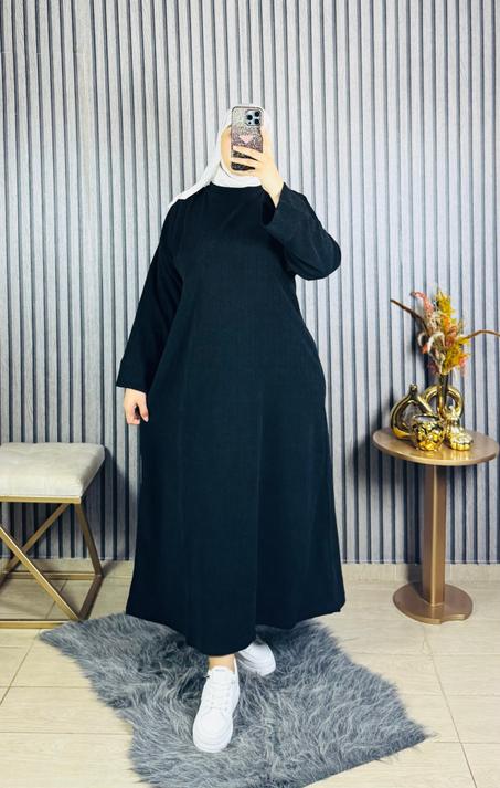 " إطلالة شتوية راقية – كسوة خيط صوفا بتصميم Oversize عصري "