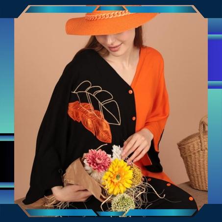 جلابية عصرية بتصميم أنيق بلونين