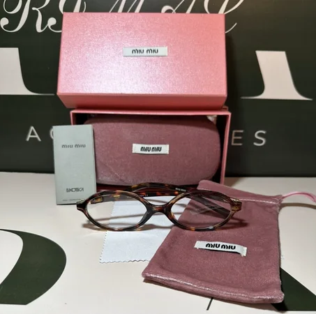 Lunettes Miu Miu à monture marron