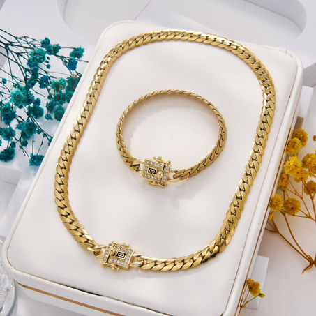 Éclat Royal - Ensemble Collier & Bracelet en Or