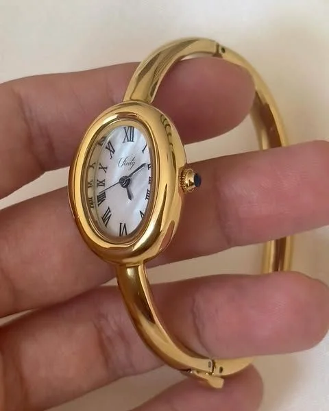 Montre Femme Ovale Dorée – Style Luxe Intemporel