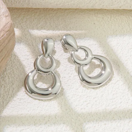 Boucles d'Oreilles "Éclipse" en Acier Inoxydable Argenté – Design Cercles Entrelacés