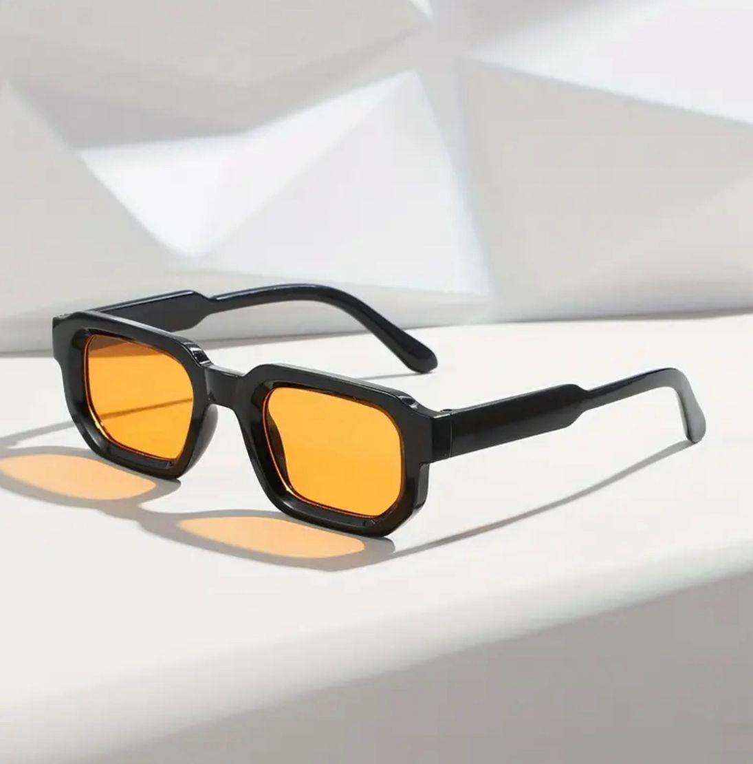 Lunettes de soleil / نظارات شمسية ( noir / orange )