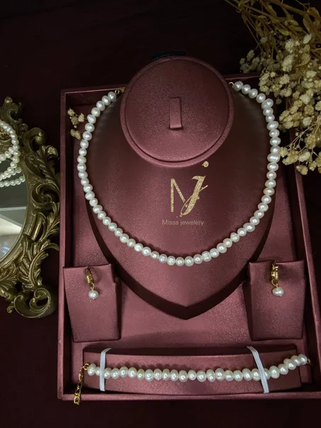 parure en perle vrai