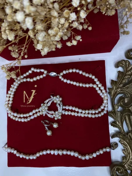 Parure en perle veretable joher 7or avec argent