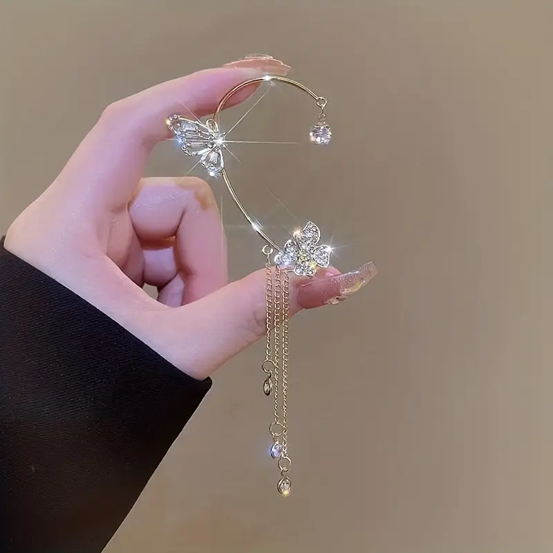 a pair of fashionable   flower ear cuffs korean     sparkly luxury womens accessories   ear cuff elegant event wear formal occasion earrings sparkly earrings   metallic   delicate   statement earrings trendy ear cuff gift for her   Product details 0