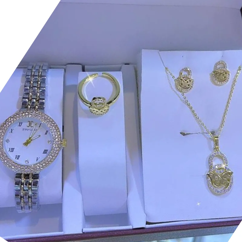 صندوق المجوهرات: ساعة + قلادة + أقراط + خاتم Coffret bijoux : Montre + collier + boucles d'oreilles + bague
