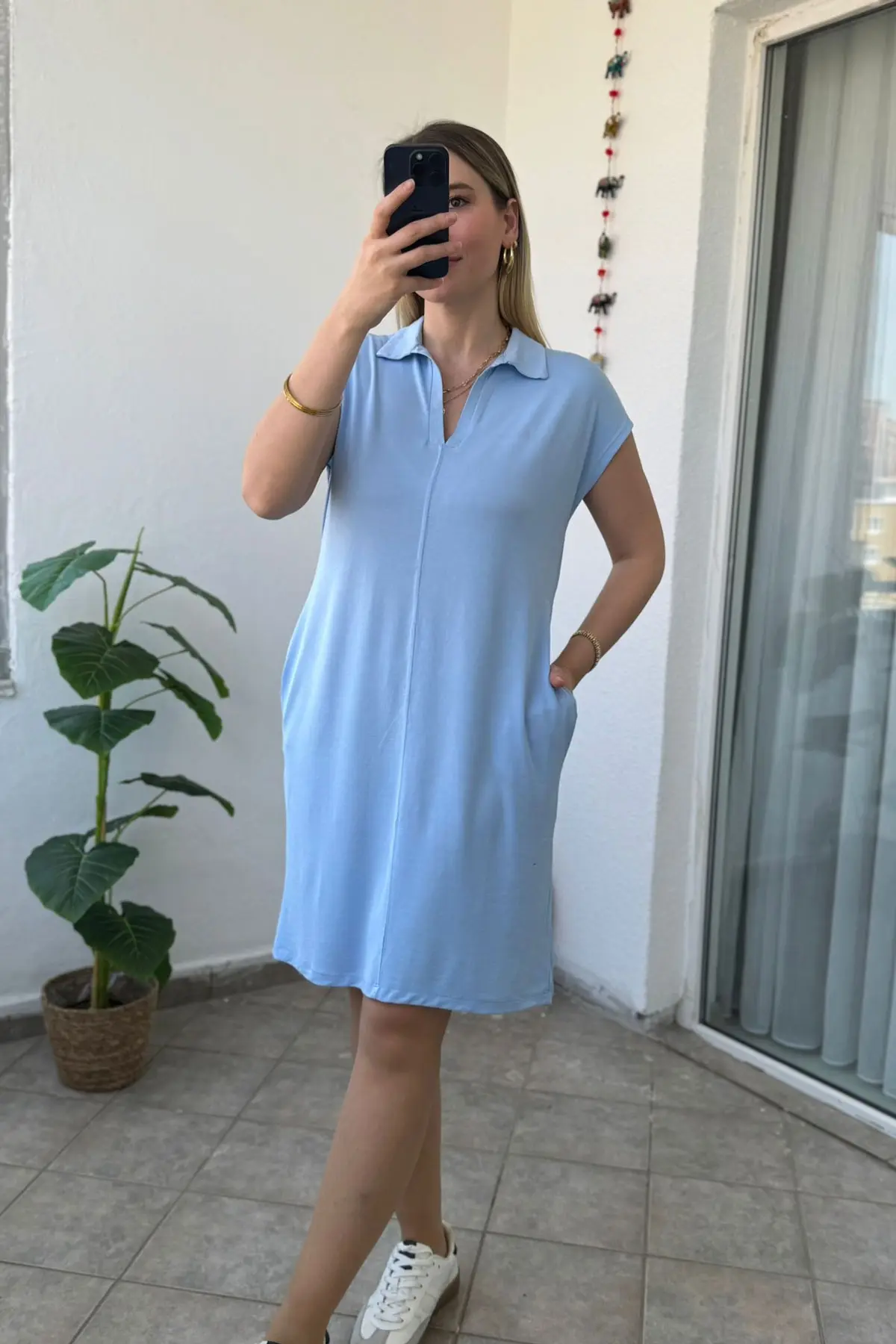 Robe sans manches à col polo et poches