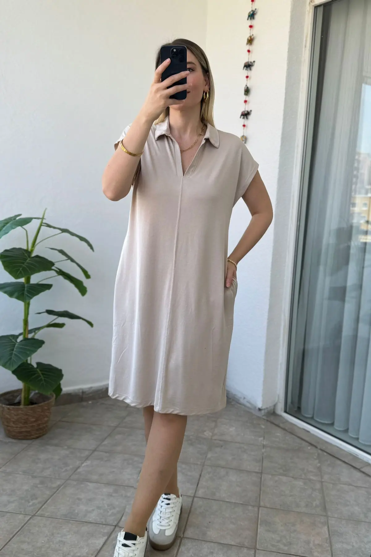 Robe sans manches à col polo et poches